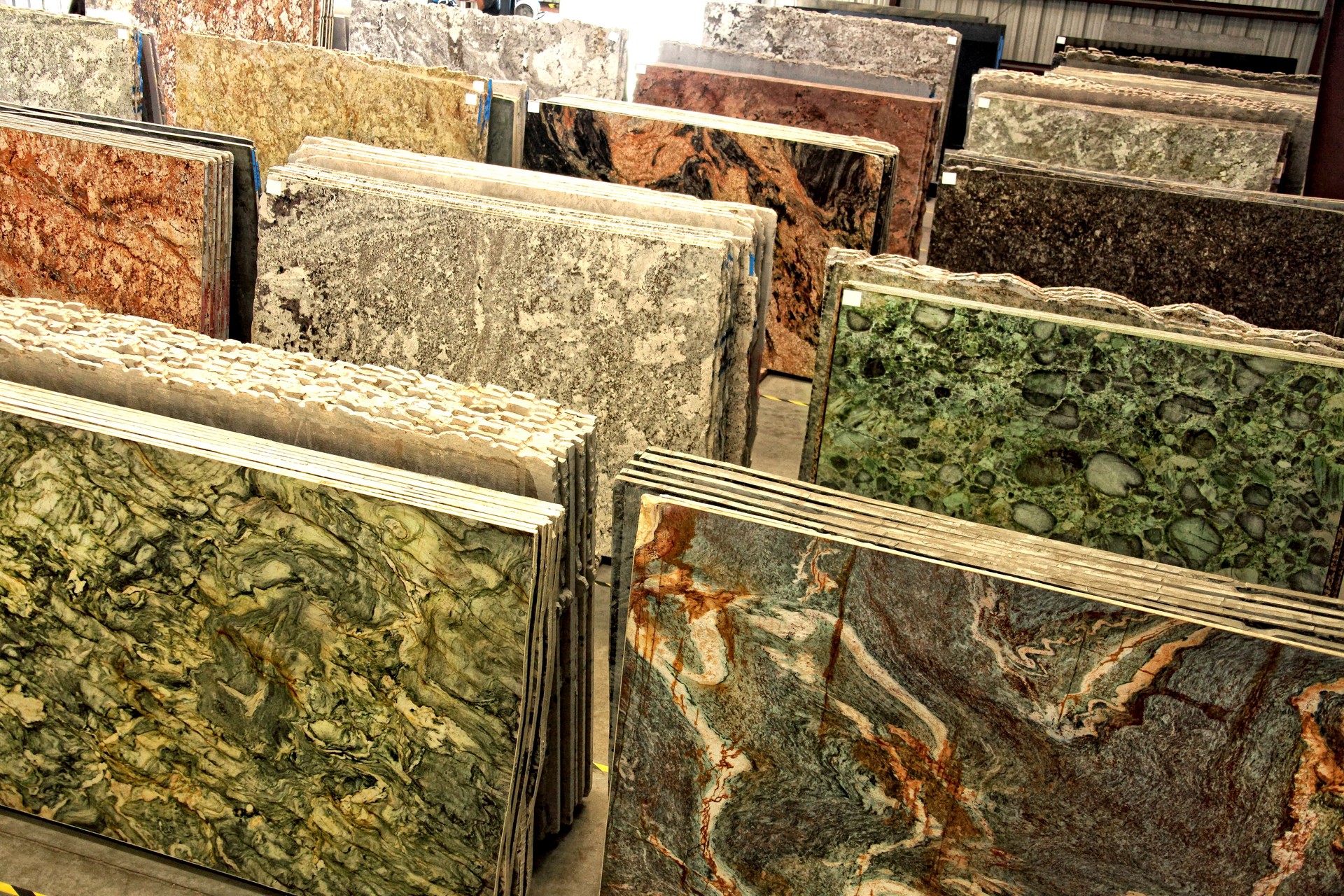 Various granite slabs at construction material store warehouse